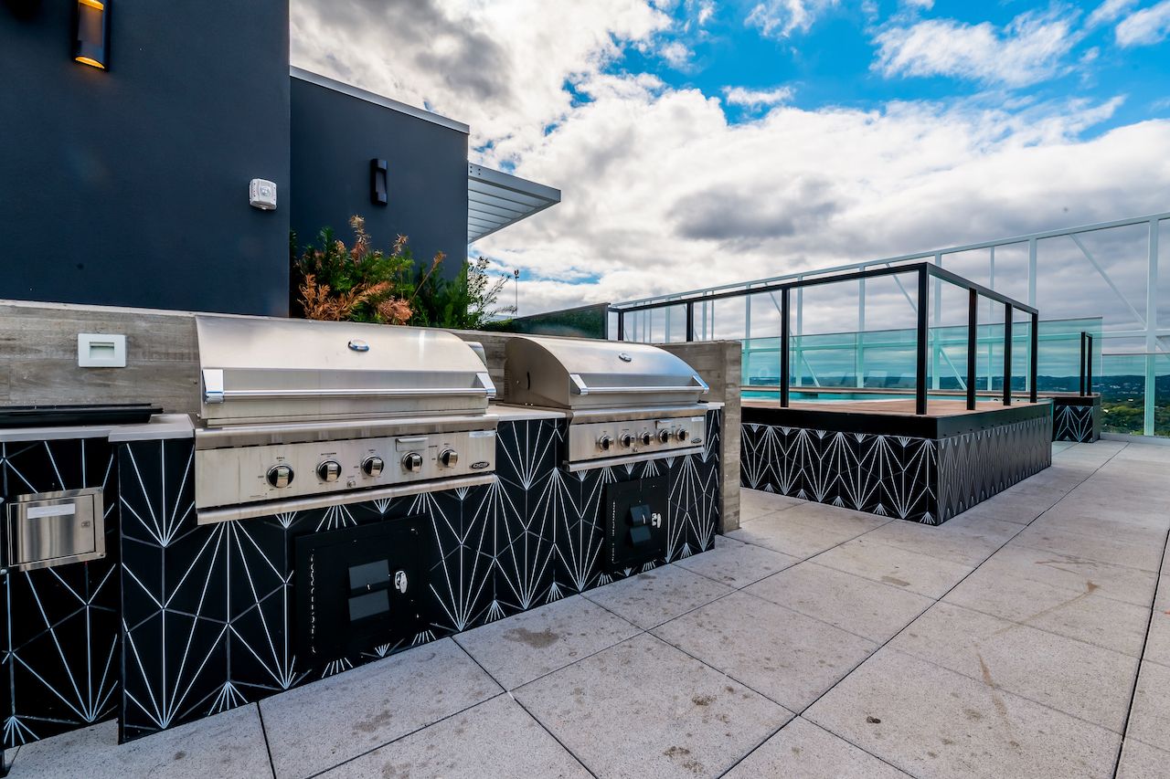 rooftop lounge bbq grills villas on rio austin