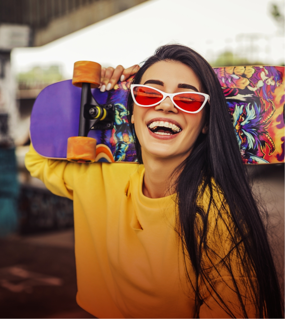 girl smiling with skateboard braces
